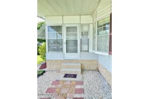 911 Oriole Circle, Barefoot Bay, FL 32976 - MLS#1052147