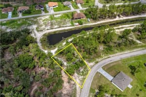 445 Burrstone Drive, Lehigh Acres, FL 33974 Sold 02/16/26