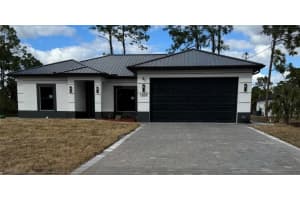 1235 COUNT ST E, Lehigh Acres, FL 33974 - MLS#2026006131