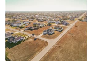 1910 1st Place, Cape Coral, FL 33993 - MLS#2026007181