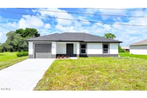 430 Burrstone Drive, Lehigh Acres, FL 33974 Sold 03/17/26