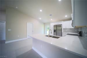 430 Burrstone Drive, Lehigh Acres, FL 33974 Sold 03/17/26