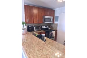 401 Golden Isles Dr, Hallandale Beach, FL 33009, Sold 06/30/21