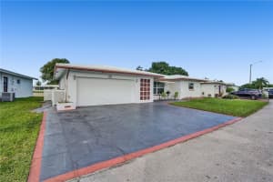 8303 NW 57th Pl, Tamarac, FL 33321 Sold 04/13/23
