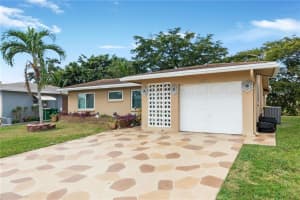 4901 Nw 49th Rd Tamarac, FL 33319 Sold 03/17/23