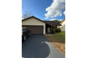 1520  Riverwood Ln Coral Springs, FL 33071 Sold 07/13/23