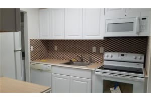 927 NE 199th St   102, Miami, FL 33179 Sold 12/08/23