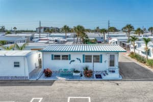 52 TWIN SHORES BOULEVARD, LONGBOAT KEY, FL 34228 Sold 07/21/23