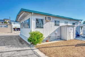 52 TWIN SHORES BOULEVARD, LONGBOAT KEY, FL 34228 Sold 07/21/23