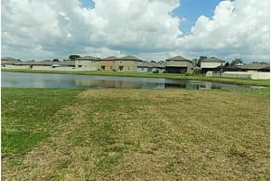 3180 OYSTER COVE STREET, WIMAUMA, FL 33598 - MLS#MFRA4660678