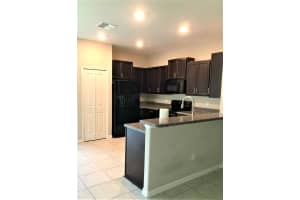 7631 FRENCH MARIGOLD AVENUE, TAMPA, FL 33619 - MLS#MFRA4664866