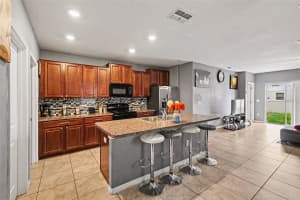 6711 BLUE MOON WAY, SUN CITY CENTER, FL 33573 - MLS#MFRA4694948