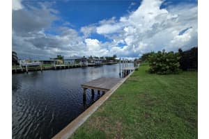 140 PECKHAM STREET, PORT CHARLOTTE, FL 33952 - MLS#MFRC7511474