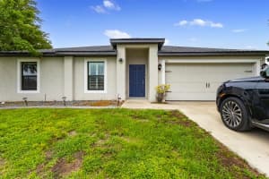 210 24TH AVENUE, CAPE CORAL, FL 33909 - MLS#MFRC7511817