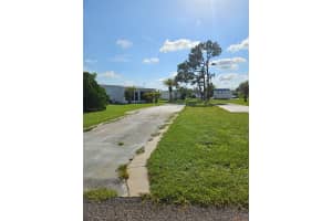 7427 WIDNESS LANE, PORT CHARLOTTE, FL 33981 - MLS#MFRC7512955
