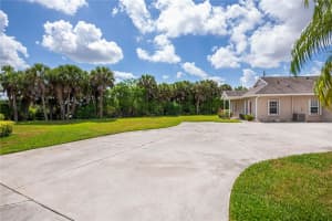 1445 RED OAK LANE, PORT CHARLOTTE, FL 33948 - MLS#MFRC7526482