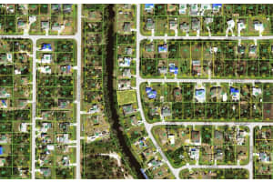 11703 CLAREMONT DRIVE, PORT CHARLOTTE, FL 33981 Sold 02/28/25