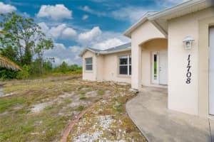 11708 WILLMINGTON BOULEVARD, PORT CHARLOTTE, FL 33981 - MLS#MFRD6144683