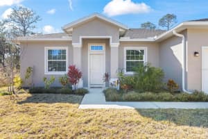 63 WHISPERING PINE DRIVE, PALM COAST, FL 32164 - MLS#MFRFC306630