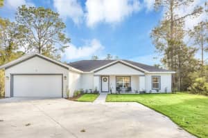 56 WHITE FEATHER LANE, PALM COAST, FL 32164 - MLS#MFRFC317612