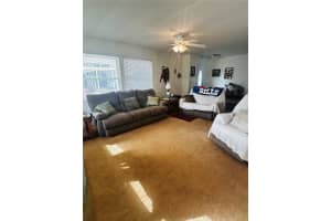 113 N TIMBER TRAIL, WILDWOOD, FL 34785 - MLS#MFRG5092620