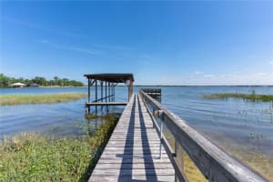 16047 SHIRLEY SHORES ROAD, TAVARES, FL 32778 Sold 09/17/25