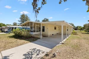 104 WINTERBERRY AVENUE, WILDWOOD, FL 34785 - MLS#MFRG5095926