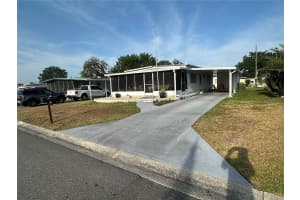 609 COACHWOOD CENTRAL, LEESBURG, FL 34748 - MLS#MFRG5096275