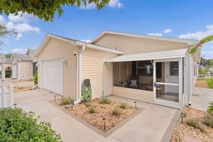 1403 ESPINOZA LANE, LADY LAKE, FL 32159 - MLS#MFRG5103682