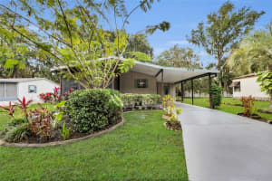 306 TIMBER TRAIL, WILDWOOD, FL 34785 - MLS#MFRG5103814