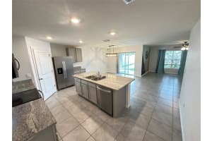 8557 TRIUMPH CIRCLE, WILDWOOD, FL 34785 - MLS#MFRG5103825