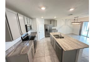 8557 TRIUMPH CIRCLE, WILDWOOD, FL 34785 - MLS#MFRG5103825