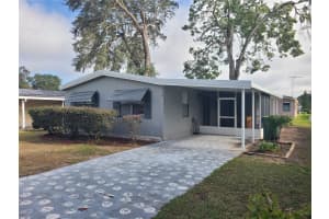 710 COACHMAN DRIVE, LEESBURG, FL 34748 - MLS#MFRG5105383