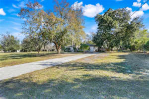 37032 GRAYS AIRPORT ROAD, LADY LAKE, FL 32159 - MLS#MFRG5105681