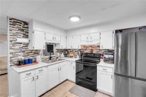 34127 WASHINGTON AVENUE, LEESBURG, FL 34788 - MLS#MFRG5108170