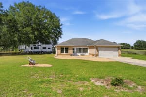 7411 180TH STREET, OXFORD, FL 34484 - MLS#MFRG5110711