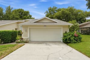 8928 VILLAGE GREEN BOULEVARD, CLERMONT, FL 34711 - MLS#MFRG5114092