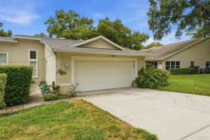 8928 VILLAGE GREEN BOULEVARD, CLERMONT, FL 34711 - MLS#MFRG5114092