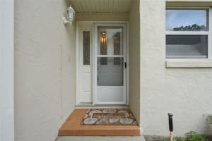 8928 VILLAGE GREEN BOULEVARD, CLERMONT, FL 34711 - MLS#MFRG5114092