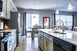 8743 CONOY AVENUE, POLK CITY, FL 33868 - MLS#MFRL4956744