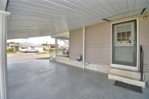 4911 COLONNADES CLUB BOULEVARD, LAKELAND, FL 33811 - MLS#MFRL4958141