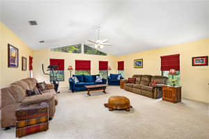 5815 SPRUCE CREEK WOODS DRIVE, PORT ORANGE, FL 32127 Sold 09/06/24