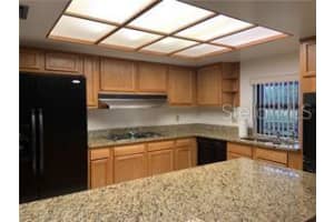 7237 WOODVILLE CRESCENT, ORLANDO, FL 32819 Sold 02/03/23