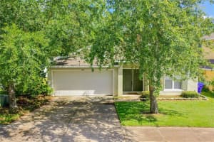 1404 LONGVILLE CIR, TAVARES, FL 32778 Sold 02/27/23