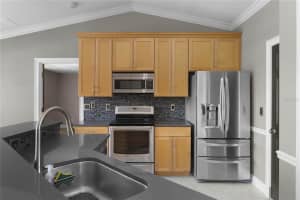 5661 CINNAMON FERN BOULEVARD, COCOA, FL 32927 Sold 01/17/23