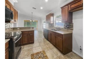 1128 BRENTON MANOR DRIVE, WINTER HAVEN, FL 33881 Sold 02/29/24
