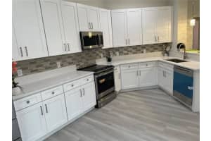 7634 BAY PORT ROAD, ORLANDO, FL 32819 Sold 12/15/23