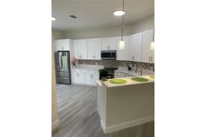 7634 BAY PORT ROAD, ORLANDO, FL 32819 Sold 12/15/23