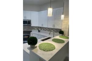 7634 BAY PORT ROAD, ORLANDO, FL 32819 Sold 12/15/23
