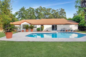 7214 WOODVILLE CRESCENT, ORLANDO, FL 32819 Sold 04/01/24